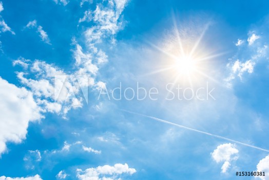 Bild på Sunny background blue sky with white clouds and sun